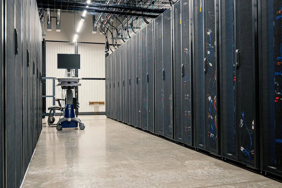 A row of server racks in a data center