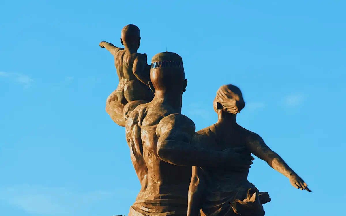 The African Renaissance Monument in Dakar, under a blue sky