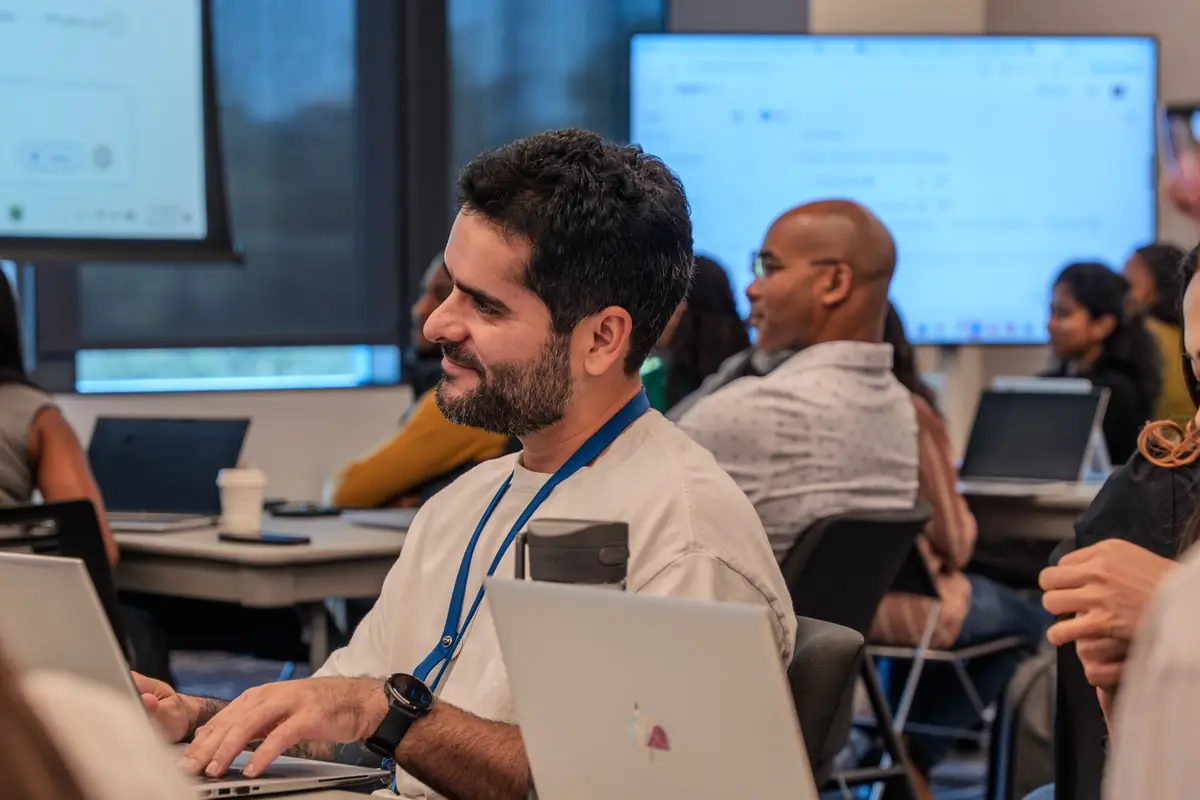 Participants on their laptops during a training workshop
